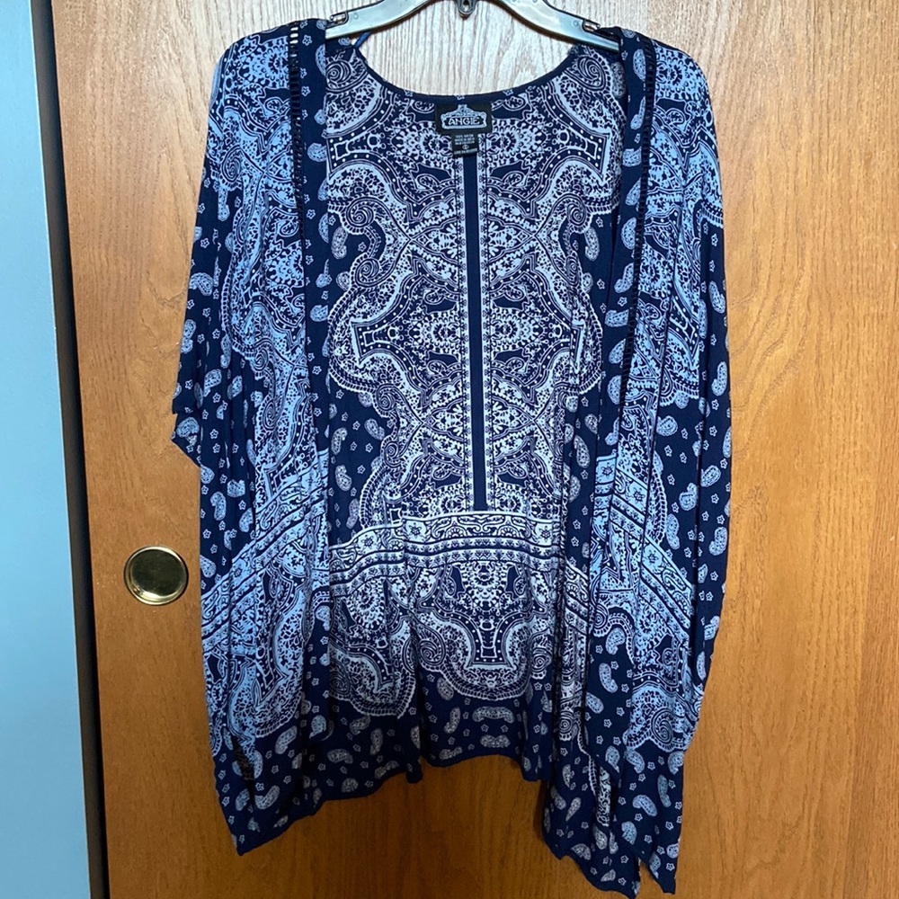 Lightweight cover up perfect over a tank top or swimsuit!